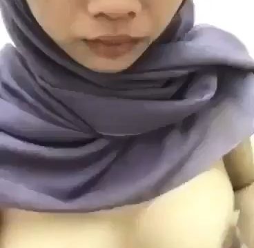 Jilbab Ungu Remas Tete